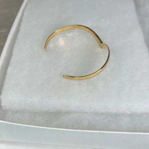 Avon gold tone V shaped cuff bracelet with faux ruby or garnet. Large - Picture 4 of 8